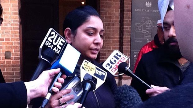 Not satisfied ... Jaspreet Kaur, the sister of homicide victim Manpreet Kaur, faces the media.