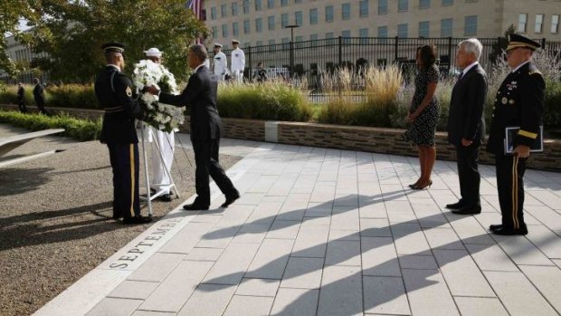 President Obama lays a wreath at the National 9/11 Pentagon Memorial.
