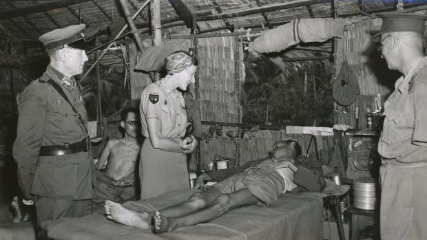 Lady Mountbatten visits Allied prisoners of war in Changi in September 1945. The men were sensitive about their lack of clothes.