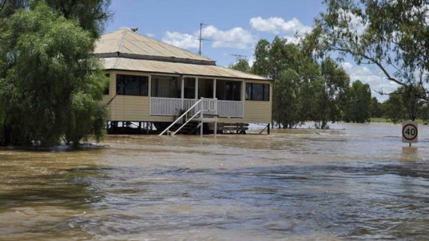 Making sure: The new levee should prevent scenes such as this in Charleville in February 2012.