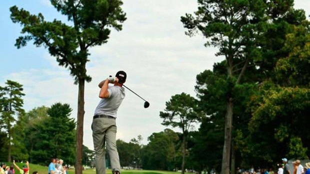 Geoff Ogilvy tees off during the Tour Championship.