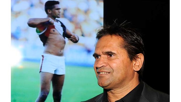 Nicky Winmar with the photo that ignited the debate about racism in football.