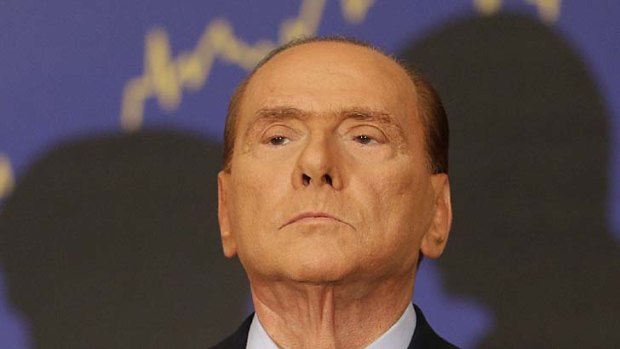 Pensive: Silvio Berlusconi awaiting the decision.
