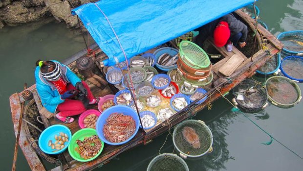 Halong Bay floating market.