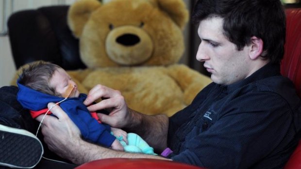 Four-week-old Victoria Branson-Zucchetto and dad Todd Zucchetto at Ronald McDonald house.