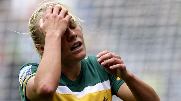 Missed opportunity ... Tameka Butt reacts after missing a chance to equalise for Australia.