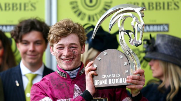 David Mullins poses with the winner's trophy.