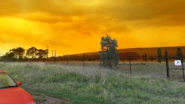 The sky above  Mount Arthur mine in Muswellbrook glows orange after a blast that went wrong.