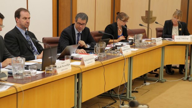 Senator Stephen Conroy during a Senate hearing with NBN Co at Parliament House in Canberra on Wednesday 11 December 2013.