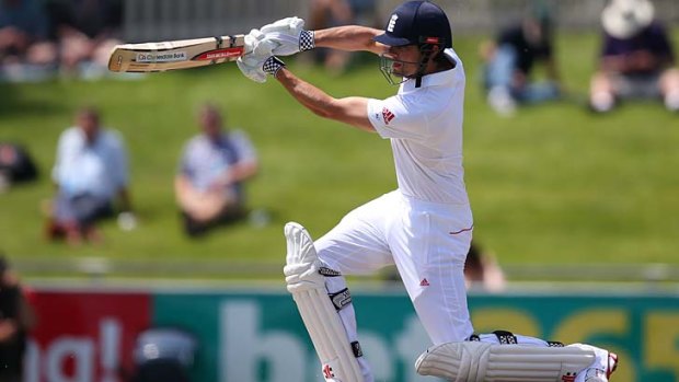 Leading from the front: Alastair Cook smashes the Australia A attack in Hobart.