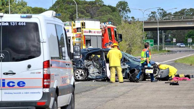 A woman was killed on the Sunshine Coast yesterday after her car collided with a van carrying batteries which exploded on impact.