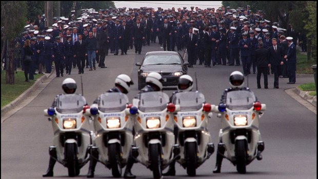 Police officers line Mountain View Road, forming a guard of honour for murdered colleague Gary Silk.