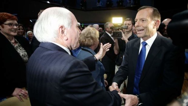 Opposition Leader Tony Abbott greets former Prime Minister John Howard during the Federal Coalition Campaign Launch.