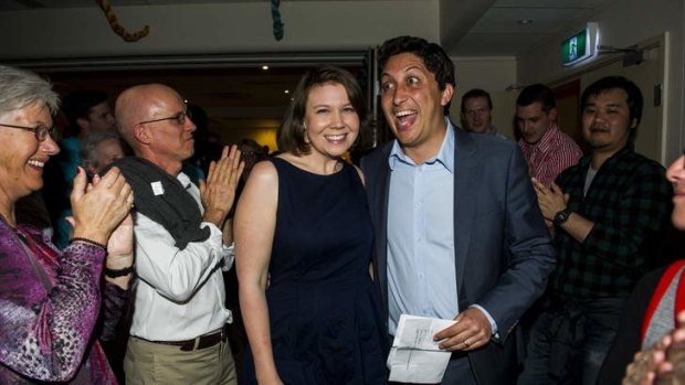 Simon Shiekh and his wife Anna Rose enter the Greens' party at The Canberra Club on election night.