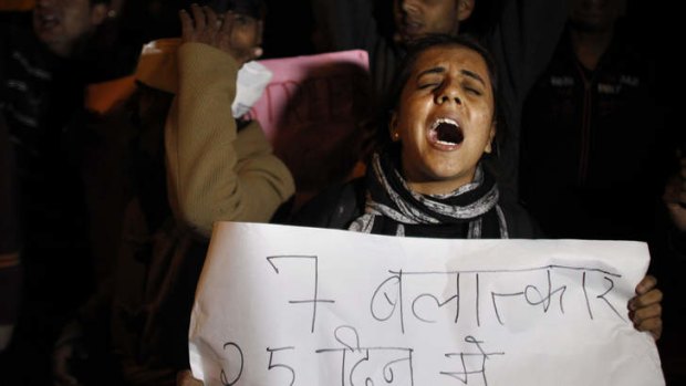 Rape protest ... an Indian woman shouts slogans outside the residence of Delhi state government Chief Minister Sheila Dikshit.
