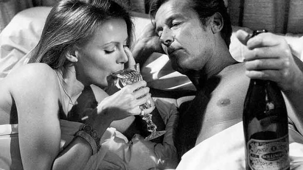 The way to the heart of a Bond girl (Britt Ekland) is clearly through champagne in The Man With The Golden Gun.