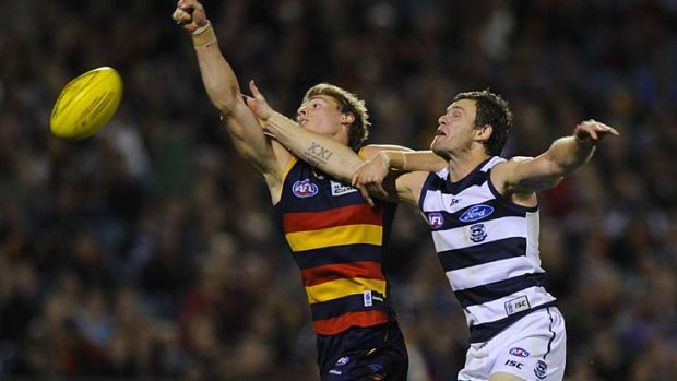 Cameron Mooney, right, and Daniel Talia during Geelong's 11-point win over Adelaide.