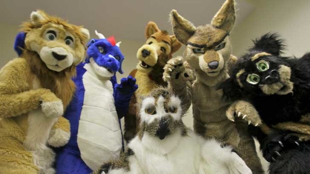 Hirstute: Like-minded individuals dressed as lions, dragons and other animals gather in Melbourne for the annual "furries" convention.
