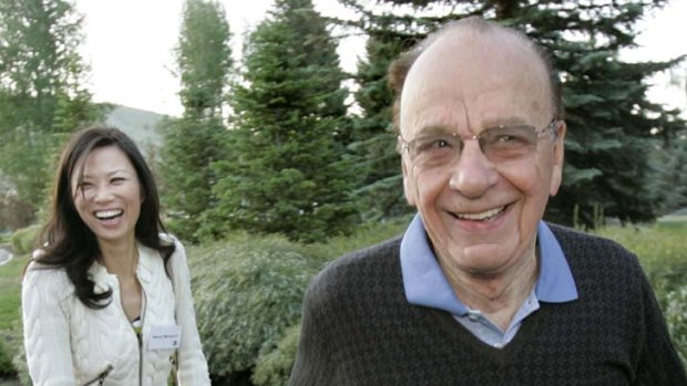 Rupert Murdoch, chairman and CEO of New Corporation with his wife, Wendi.