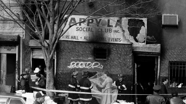 The charred exterior of the Happy Land Social Club in the Bronx, where 87 people died in 1990.
