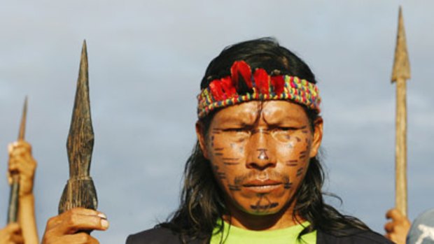 "They're killing us for defending our lives, our sovereignty, human dignity" ... an indigenous man in Peru protests against development in the Amazon jungle.