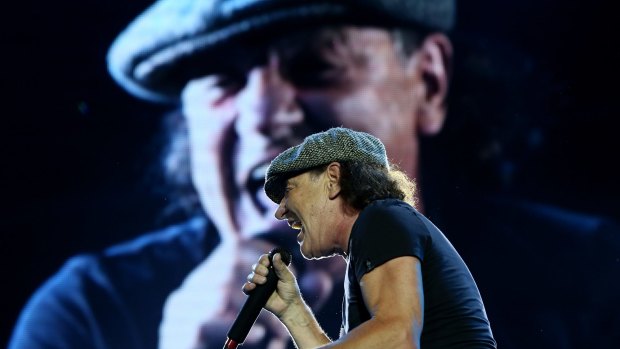 AC/DC lead singer Brian Johnson struts the stage at ANZ Stadium.