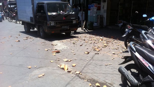 Debris in a street in Legian after this morning's earthquake. Picture Rodney Higgins.