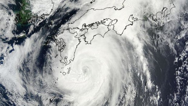 This image taken by NASA's Terra satellite shows Typhoon Halong in the Pacific Ocean, approaching Japan's main islands. Authorities ordered 1.6 million people out of the path of the storm that battered the west of the country.