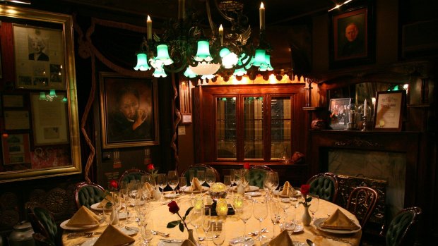 The table is set at the The Houdini Seance Room at The Magic Castle.