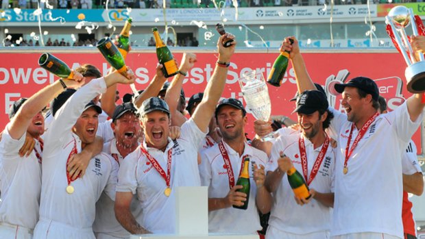 We "urned" it ...  England captain Andrew Strauss holds aloft the Ashes trophy aloft as the rest of his team celebrates after beating Australia at the Oval last August. The next series begins in Brisbane in November.