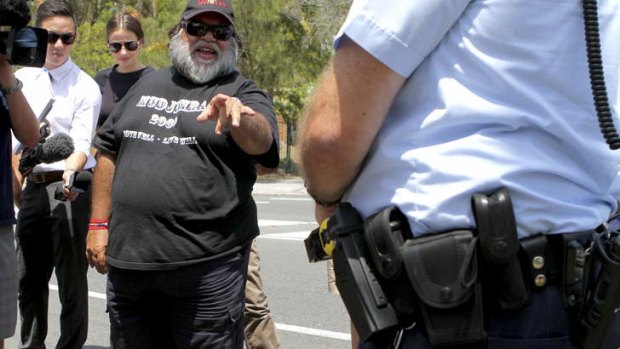 High profile Aboriginal activist Sam Watson was unhappy police turned up with tasers at a protest rally against their use.