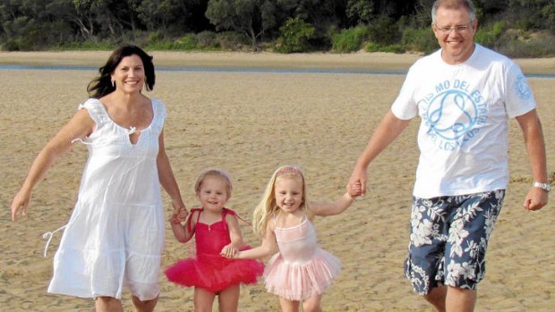 Family man … Morrison with his wife, Jenny, and daughters Lily (at left) and Abbey, on a recent holiday.