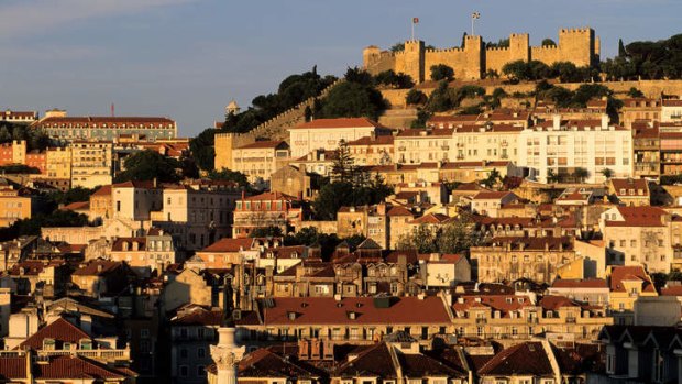 Castelo Sao Jorge (Castle Saint George) dominates the Lisbon skyline.