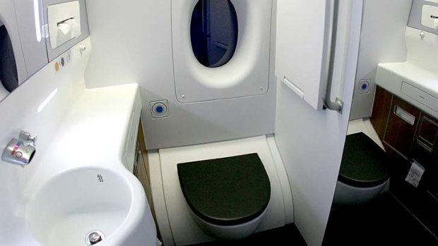 Tight squeeze ... a toilet on board a Qantas A380. A US manufacturer has come up with a new design that will shrink plane toilets even further. Delta Air Lines will be the first to install the toilets on their Boeing 737s.