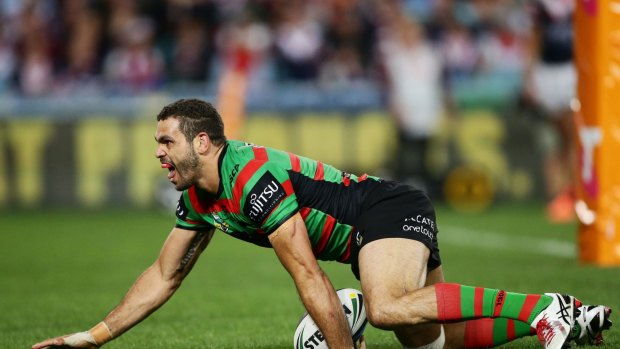 Drought breaker: Inglis crosses for the final try of the 2014 Grand Final. 