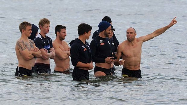 Showing the way: Chris Judd makes a point during Carlton's session at the St Kilda baths.