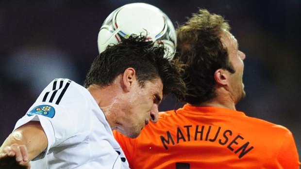 Mario Gomez scored a brace for Germany to leave The Netherlands on the verge of elimination.