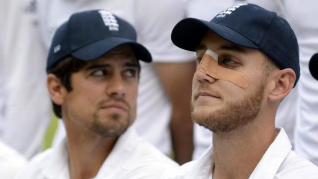 In the wars: Stuart Broad, right, after he was hit in the face during the fifth Test against India. 