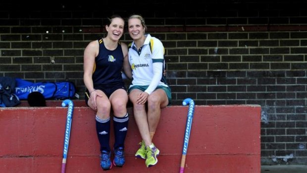 Meredith Bone (left) with her twin sister, Hockeyroos player Edwina Bone, at the National Hockey Centre.