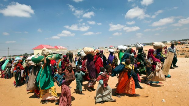 Families displaced by drought arrive at makeshift camps ion the outskirts of Mogadishu, Somalia.