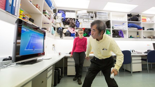 Dr Penelope McNulty with stroke patient Si Saegusa, who is using a Nintendo Wii for rehabilitation.