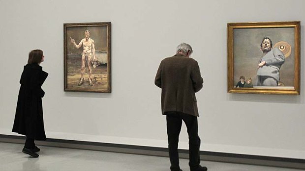 Painter working, Reflection (left) and Reflection with Two Children (right) two paintings of Britain's Lucian Freud. Benefits Supervisor Sleeping, which sold for $A$31.2m.