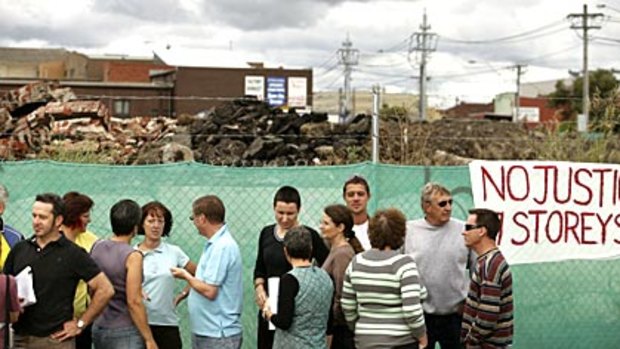Residents gather at the site of a proposed development in Coburg.