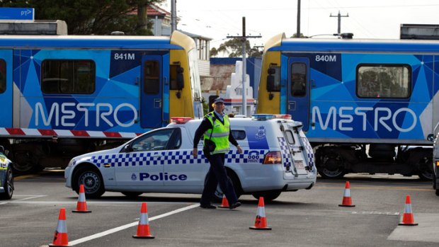 Police at the scene of the fatal strain strike at Moreland railway station.