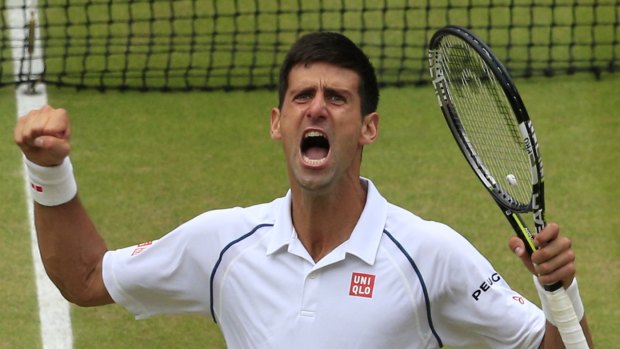 Done it: Novak Djokovic celebrates winning the Wimbledon title against Roger Federer.