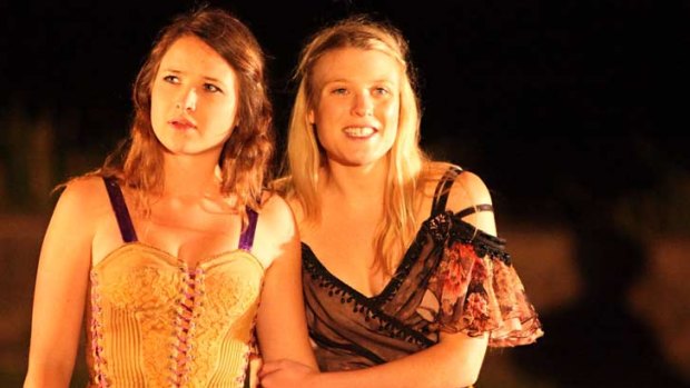 Emma Cooperthwaite as Hermia and Olivia Beardsley as Helena in A Midsummer Night's Dream.