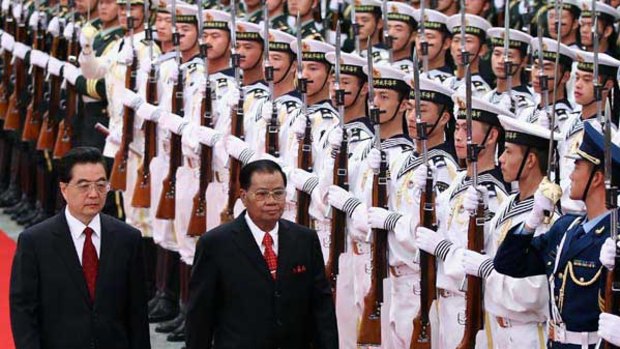 Chinese President Hu Jintao and Burma's dictator, General Than Shwe, review an honour guard at a welcome ceremony in the Great Hall of the People. <i>Picture: Getty</i>