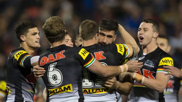 Back from the brink: The Panthers celebrate James Tamou's try against Manly in round 18.