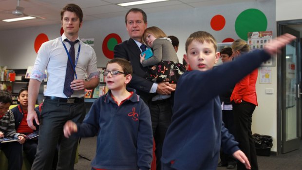 Education Minister Bill Shorten visits the Jackson  School in St Albans  with his daughter Clementine.