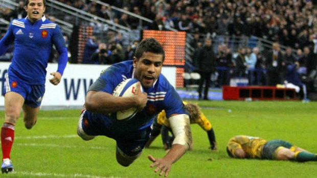 Smooth landing: French winger Wesley Fofana scores a second-half try against the Wallabies at the Stade de France in Paris.